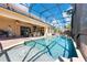 Beautiful screened-in pool area with lush landscaping, perfect for relaxing and enjoying the outdoors at 4932 Eastlake Vista Dr, St Cloud, FL 34771