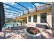 Beautiful outdoor pool area with landscaping, perfect for relaxing and enjoying the outdoors at 4932 Eastlake Vista Dr, St Cloud, FL 34771