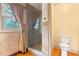 Modern bathroom with a glass-enclosed shower and stylish tile at 511 Woodlawn Blvd, Orlando, FL 32801