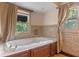 Relaxing bathroom featuring a large soaking tub and elegant tile work at 511 Woodlawn Blvd, Orlando, FL 32801