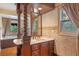Elegant bathroom with a marble countertop and view of the soaking tub at 511 Woodlawn Blvd, Orlando, FL 32801