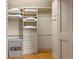 Organized walk-in closet with built-in shelving and plenty of storage space at 511 Woodlawn Blvd, Orlando, FL 32801