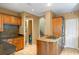 Kitchen with a gas cooktop, modern appliances, and granite countertops at 511 Woodlawn Blvd, Orlando, FL 32801