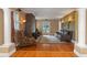 Spacious living room with a fireplace, hardwood floors, and natural light at 511 Woodlawn Blvd, Orlando, FL 32801