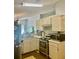 Well-equipped kitchen featuring stainless steel appliances and neutral cabinetry at 526 Seasons Ct, Winter Springs, FL 32708