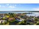Aerial view of a luxurious lakeside community with stunning waterfront homes at 5762 Emerington Cres, Orlando, FL 32819