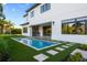 Beautiful backyard showcasing a pool and an outdoor kitchen area at 5762 Emerington Cres, Orlando, FL 32819