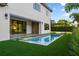 Beautiful backyard showcasing a pool and an outdoor kitchen area at 5762 Emerington Cres, Orlando, FL 32819