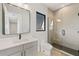 Contemporary bathroom featuring sleek vanity, walk-in shower with glass enclosure, and modern fixtures at 5762 Emerington Cres, Orlando, FL 32819