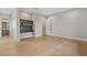 Neutral bedroom with hardwood flooring, large closet and a desk niche with a gray worktop and wall shelving at 5762 Emerington Cres, Orlando, FL 32819