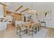 Open concept space showcasing the dining room with custom lighting at 5762 Emerington Cres, Orlando, FL 32819