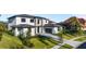 Beautiful view of the home, showcasing its gray stone driveway and manicured lawn at 5762 Emerington Cres, Orlando, FL 32819