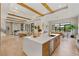 Modern kitchen with an island, stainless steel appliances, and an open floor plan at 5762 Emerington Cres, Orlando, FL 32819