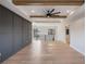 Open living room boasting hardwood floors, tray ceilings, and stylish accents at 5762 Emerington Cres, Orlando, FL 32819