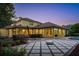 Expansive backyard featuring a covered patio, fire pit, pool and spa for the perfect outdoor oasis at 6143 Cartmel Ln, Windermere, FL 34786