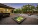 Expansive backyard featuring a spa, and outdoor living area, and lush landscaping for the perfect outdoor oasis at 6143 Cartmel Ln, Windermere, FL 34786