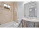 Bathroom featuring a vanity, marble countertops, soaking tub, and walk-in shower at 6143 Cartmel Ln, Windermere, FL 34786