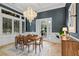 Open dining room with decorative lighting, hardwood floors, and french doors at 6143 Cartmel Ln, Windermere, FL 34786