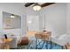 Cozy office space with a wooden desk, comfortable chair, and natural lighting at 6143 Cartmel Ln, Windermere, FL 34786