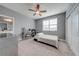 Cozy bedroom featuring neutral walls, carpet, and a comfortable twin bed at 6667 Alder Rd, Harmony, FL 34773