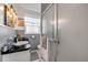 Bathroom featuring shower, commode, sink, and vanity at 825 Second St, Orange City, FL 32763