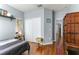This bedroom features wood floors, closet and a minimalist design at 8419 Chamberlain Pl, Oviedo, FL 32765