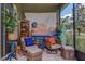 Inviting screened porch with comfortable seating and stylish decor, perfect for relaxing outdoors at 8419 Chamberlain Pl, Oviedo, FL 32765