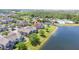 Beautiful waterfront townhomes featuring a community pool and lush landscaping, all with lake access at 8997 Lee Vista Blvd # 2009, Orlando, FL 32829