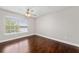 Bedroom with wood flooring and lake view at 8997 Lee Vista Blvd # 2009, Orlando, FL 32829