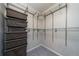 Walk-in closet with wire shelving and storage bins at 8997 Lee Vista Blvd # 2009, Orlando, FL 32829