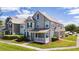 Tastefully painted townhome with covered porch and manicured landscaping at 8997 Lee Vista Blvd # 2009, Orlando, FL 32829