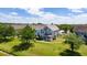 Well-maintained townhome with verdant lawn, mature trees and guest parking at 8997 Lee Vista Blvd # 2009, Orlando, FL 32829