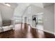 Bright and airy living room boasts high ceilings, big windows, and hardwood floors at 8997 Lee Vista Blvd # 2009, Orlando, FL 32829