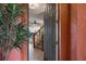 Open foyer with tiled floor, view of living spaces, and staircase leading to the upper level at 9478 Silver Buttonwood St, Orlando, FL 32832