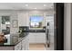 Close-up of a modern kitchen with stainless steel appliances and granite countertops at 9478 Silver Buttonwood St, Orlando, FL 32832