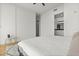 Large bedroom with ensuite bathroom and closet, wood floors, and neutral decor at 150 E Robinson St # 2506, Orlando, FL 32801