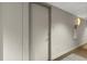 Hallway entrance to unit features a neutral color scheme and is equipped with a fire extinguisher at 150 E Robinson St # 2506, Orlando, FL 32801