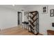 Hall leads into the living area and features a decorative shelving unit and modern decorations at 150 E Robinson St # 2506, Orlando, FL 32801