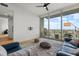 Comfortable living room with floor to ceiling windows with beautiful views and access to the balcony at 150 E Robinson St # 2506, Orlando, FL 32801