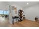 Open living room features views to the balcony and a modern bookshelf at 150 E Robinson St # 2506, Orlando, FL 32801