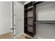 Spacious walk-in closet with custom shelving and hanging rods for optimal storage at 150 E Robinson St # 2506, Orlando, FL 32801