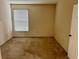 Spacious bedroom featuring neutral walls, carpet flooring, and a window with blinds at 107 Vista Verdi Cir # 121, Lake Mary, FL 32746