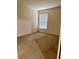 Neutral bedroom featuring carpet flooring, bright window with blinds, and empty floor plan at 107 Vista Verdi Cir # 121, Lake Mary, FL 32746