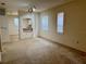 Bright living room boasts neutral tones, large windows, and ample natural light at 107 Vista Verdi Cir # 121, Lake Mary, FL 32746