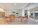 Conference room with multiple tables and chairs at 322 E Central Blvd # 1008, Orlando, FL 32801
