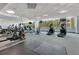 Spacious gym offering stationary bikes, elliptical machines, and mirrored walls at 322 E Central Blvd # 1008, Orlando, FL 32801