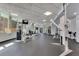 Bright gym featuring state-of-the-art equipment and mounted televisions for entertainment at 322 E Central Blvd # 1008, Orlando, FL 32801