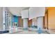 A stylish lobby features modern decor, elegant lighting, and comfortable seating for visitors and residents alike at 322 E Central Blvd # 1008, Orlando, FL 32801