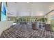 Bright common area with modern furnishings, patterned carpet, and large windows offering a relaxing space at 322 E Central Blvd # 1008, Orlando, FL 32801