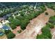 Aerial view of a neighborhood showcasing lush surroundings near a greenbelt with walking trails at 3835 Rock Hill Loop, Apopka, FL 32712